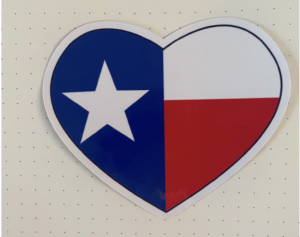 Heart shaped glossy vinyl sticker with the design of the Texas Flag inside the heart.