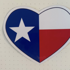 Heart shaped glossy vinyl sticker with the design of the Texas Flag inside the heart.